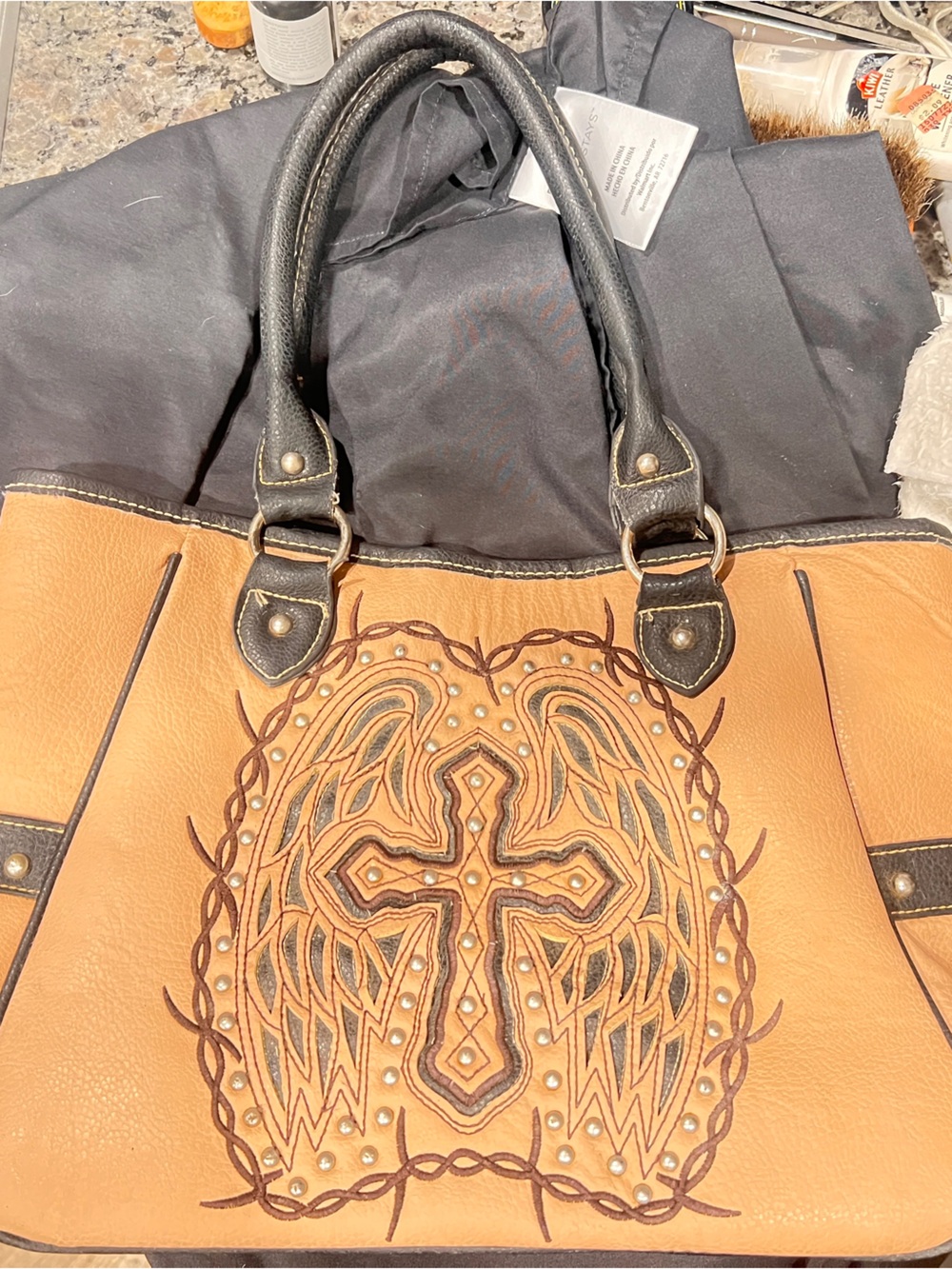 Embroidered Tan Tote with Black Trim and Stud Details